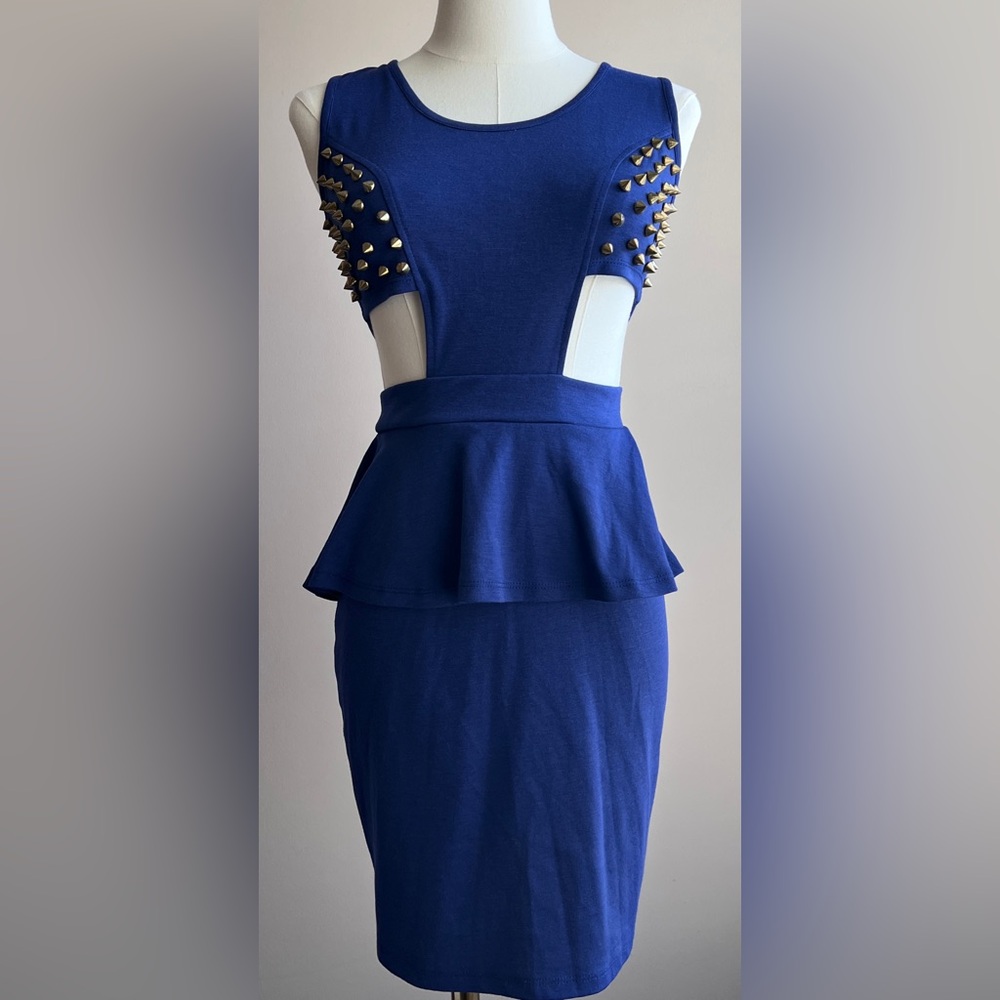 Size Small Woman’s dress with side cutouts and spikes